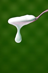 Spoon with yogurt