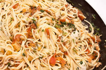 seafood spaghetti in a pan