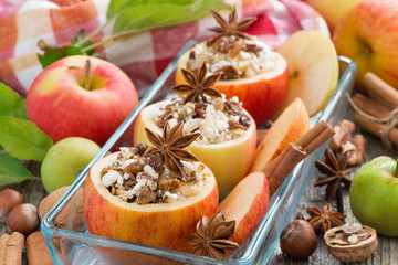 prepared for baking stuffed apples in a glass form, horizontal