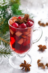 Spicy Christmas mulled wine on a silver background