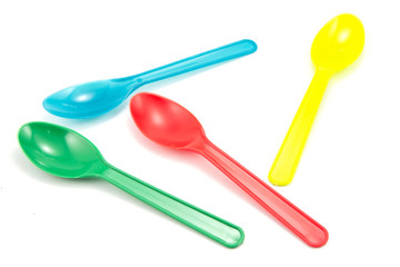 plastic ice cream spoons color on a white background.