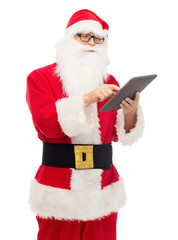 man in costume of santa claus with tablet pc