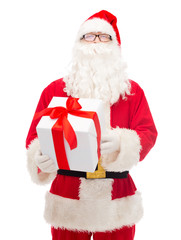 man in costume of santa claus with gift box