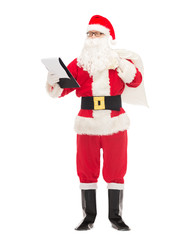 man in costume of santa claus with notepad and bag