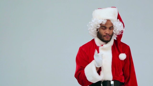 Angry Santa Claus shakes his finger to you