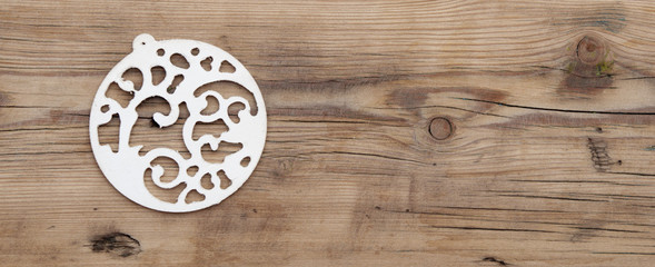 A singel christmas ball on wood with copy space