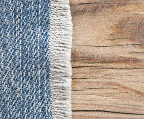 blue jean texture on wood texture background