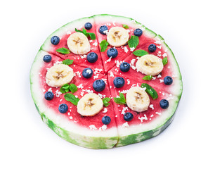 Watermelon pizza on white
