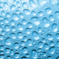 Blue water drops background
