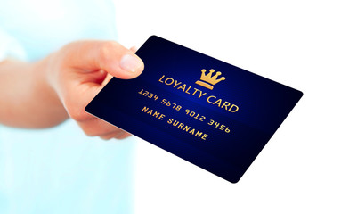 hand holding loyalty card isolated over white