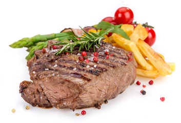 Beef steak on white background © Lukas Gojda