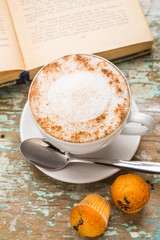 Cappuccino coffee with muffins