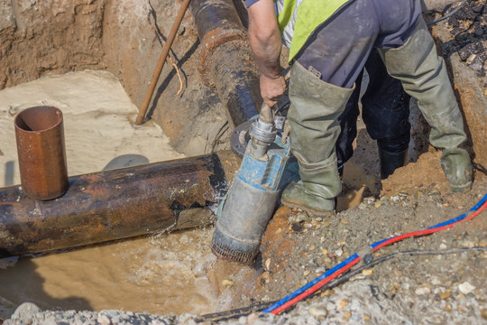 Submersible water pump drain trench