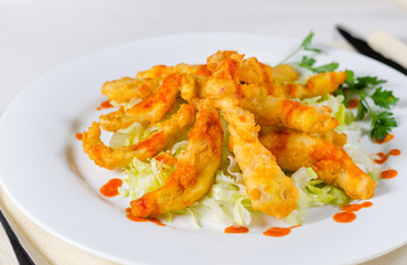 Appetizing Main Course on Table Utensils on Side