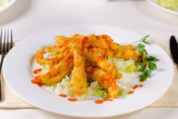 Appetizing Main Course on Table Utensils on Side