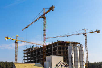 Building cranes on construction