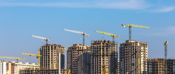 Building cranes on construction