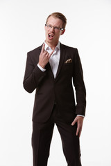 businessman in glasses enjoys fooling around emotional victory