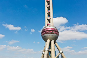 Naklejka premium Shanghai Oriental pearl TV tower under the blue sky.
