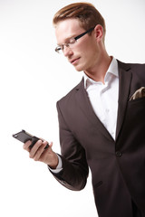 businessman in glasses with a telephone