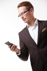 businessman in glasses with a telephone