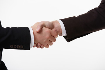 handshake of two businessmen fore