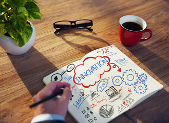 Man Sketching and Working on Innovation Concept