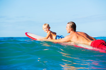 Father and Son Going Surfing