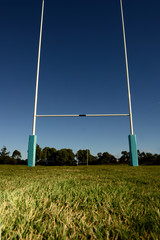 Goal Posts set against a blue sky.