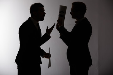 two businessmen arguing - obrazy, fototapety, plakaty