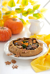 Galette with pumpkin, mushrooms and broccoli, selective focus