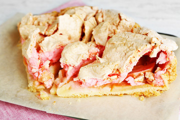 Piece of tasty pie with apples and berry mousse