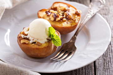 Baked peaches with ice cream