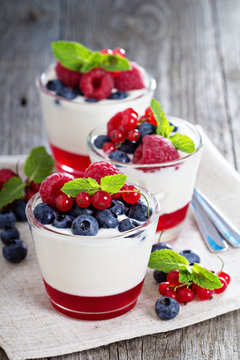 Yogurt dessert with jelly and fresh berries