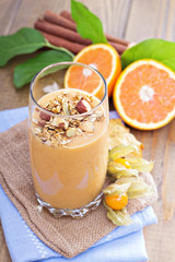 Pumpkin smoothie with granola on top