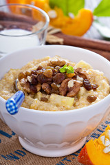 Pumpkin millet porridge with apple and raisins