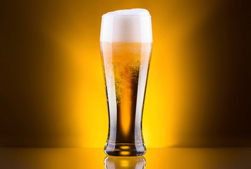 Frosty glass of light beer