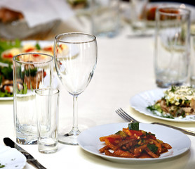 Glasses for drinks and cocktails at the festive table
