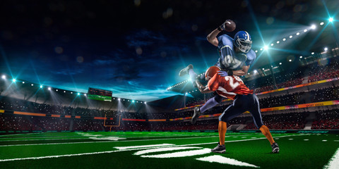 Fototapeta premium American football player in action at game time
