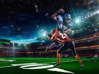 Tuinposter American football player in action at game time © 103tnn