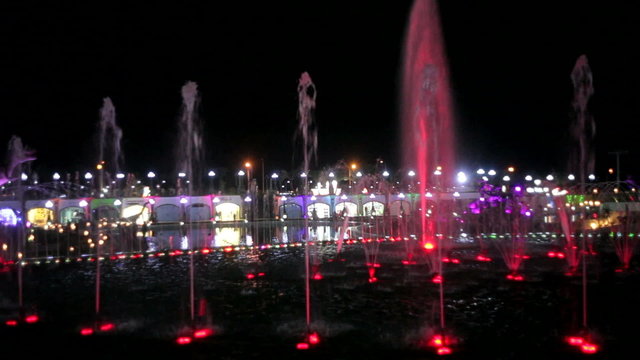 Beautiful night fountain with colored backlight