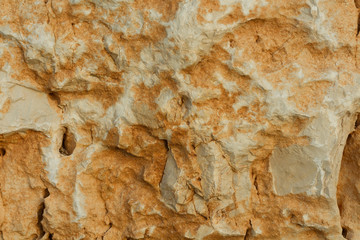 Texture - light yellow sandstone, structure of stone.