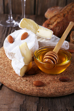 Camembert cheese, nuts, honey and bread