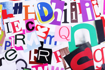 Colorful newspaper letters as background