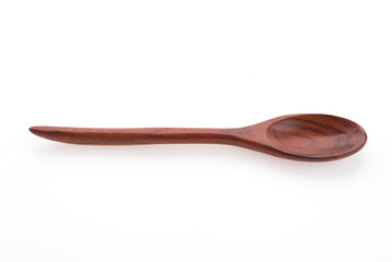 Wooden spoon isolated on white background