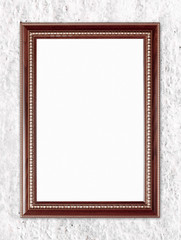 blank wood frame on stone cement wall