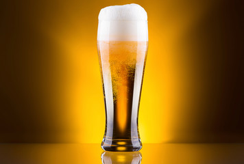 Frosty glass of light beer
