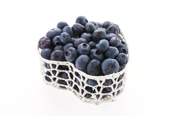 Blueberry basket isolated on white
