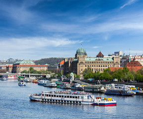 Fototapeta premium Tourist boats on Vltava river in Prague