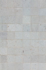 Natural grey stone brick wall texture and background